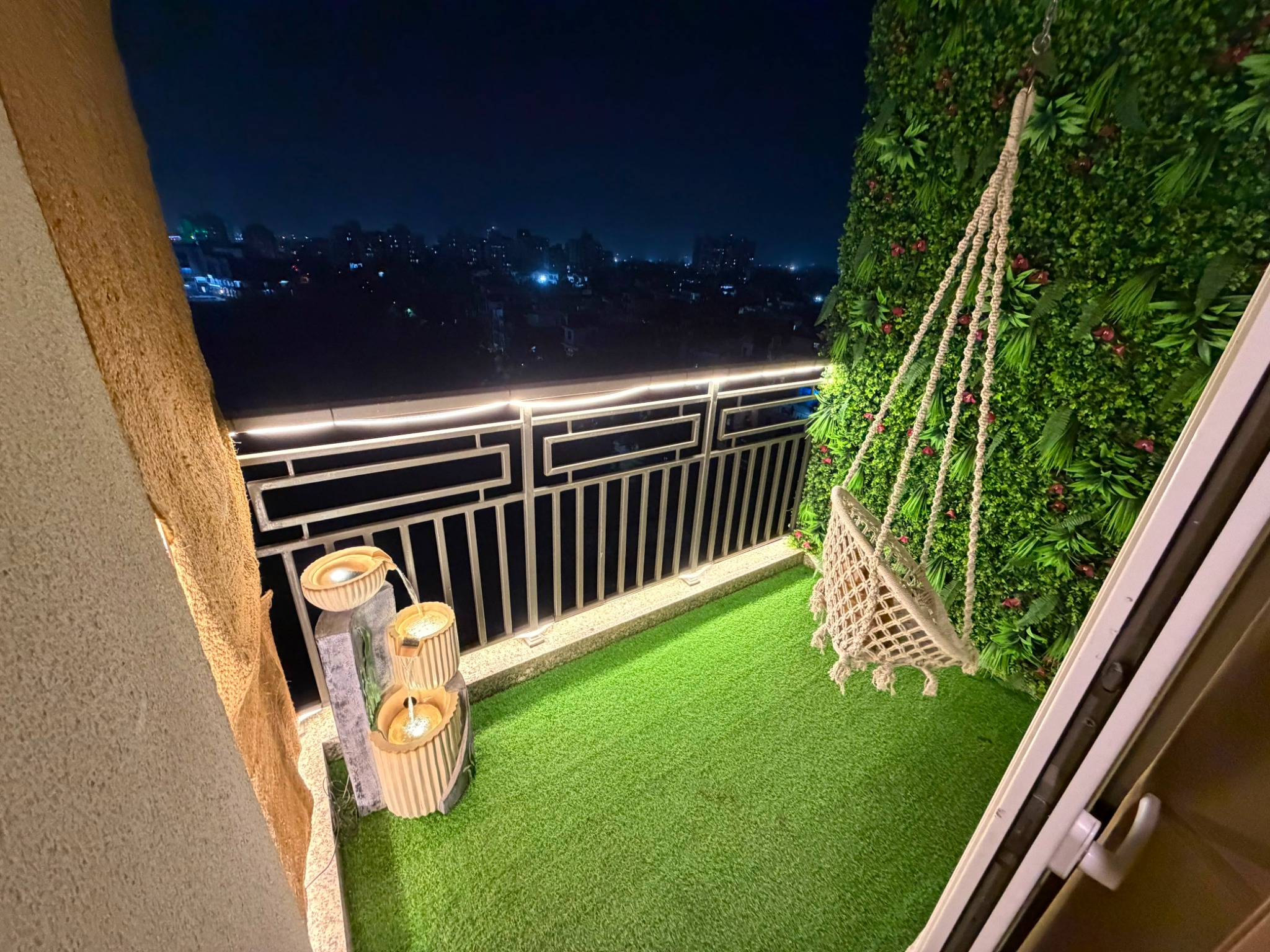 Bliss Suites balcony at night